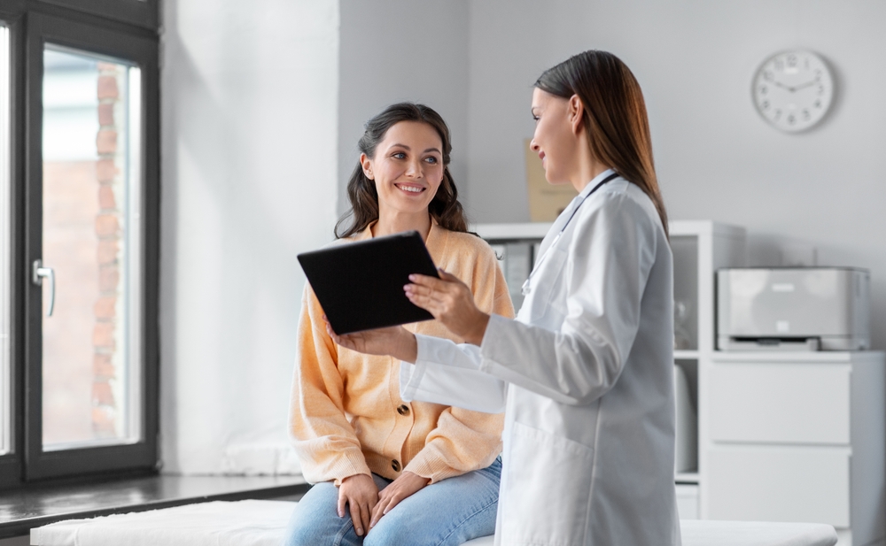 medical professional explains plan to patient